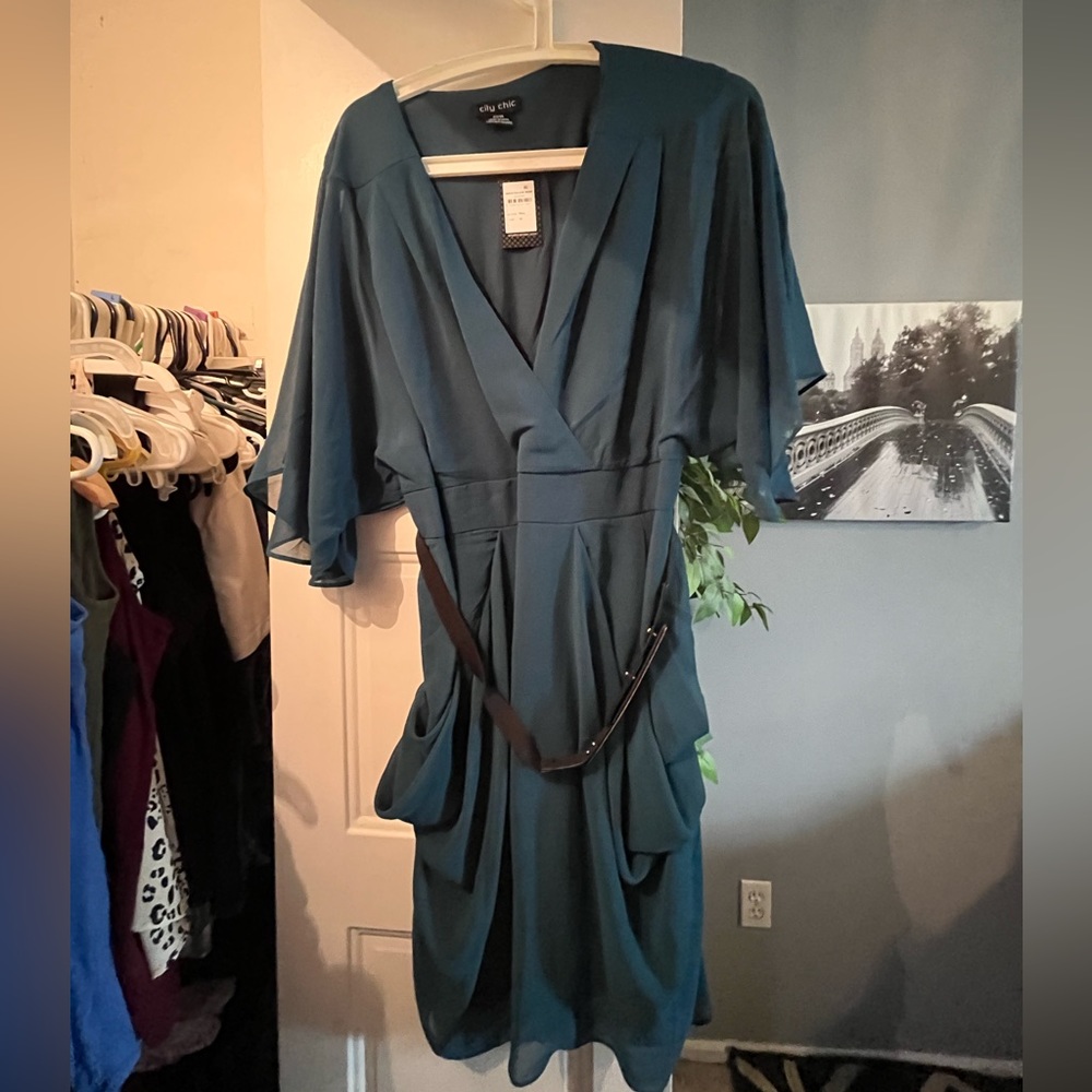 Blue flowy dress with black stretchy belt with pretty shiny thin belt